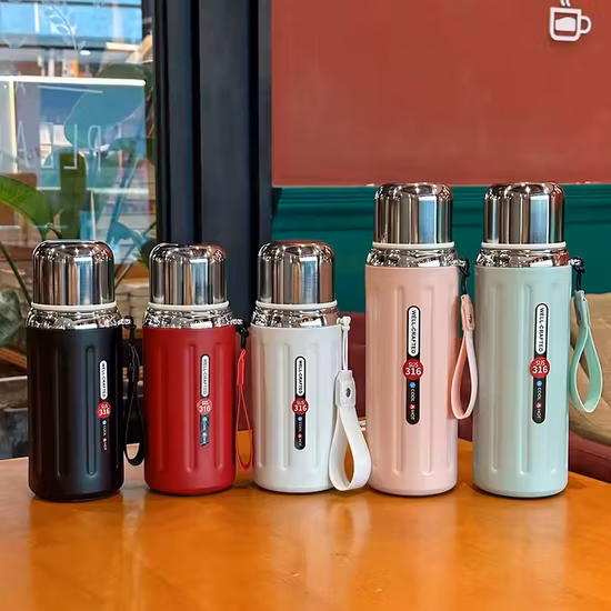 Garrafa de água a vácuo de aço inoxidável com isolamento de parede dupla de cor gradiente com logotipo personalizado 600ml